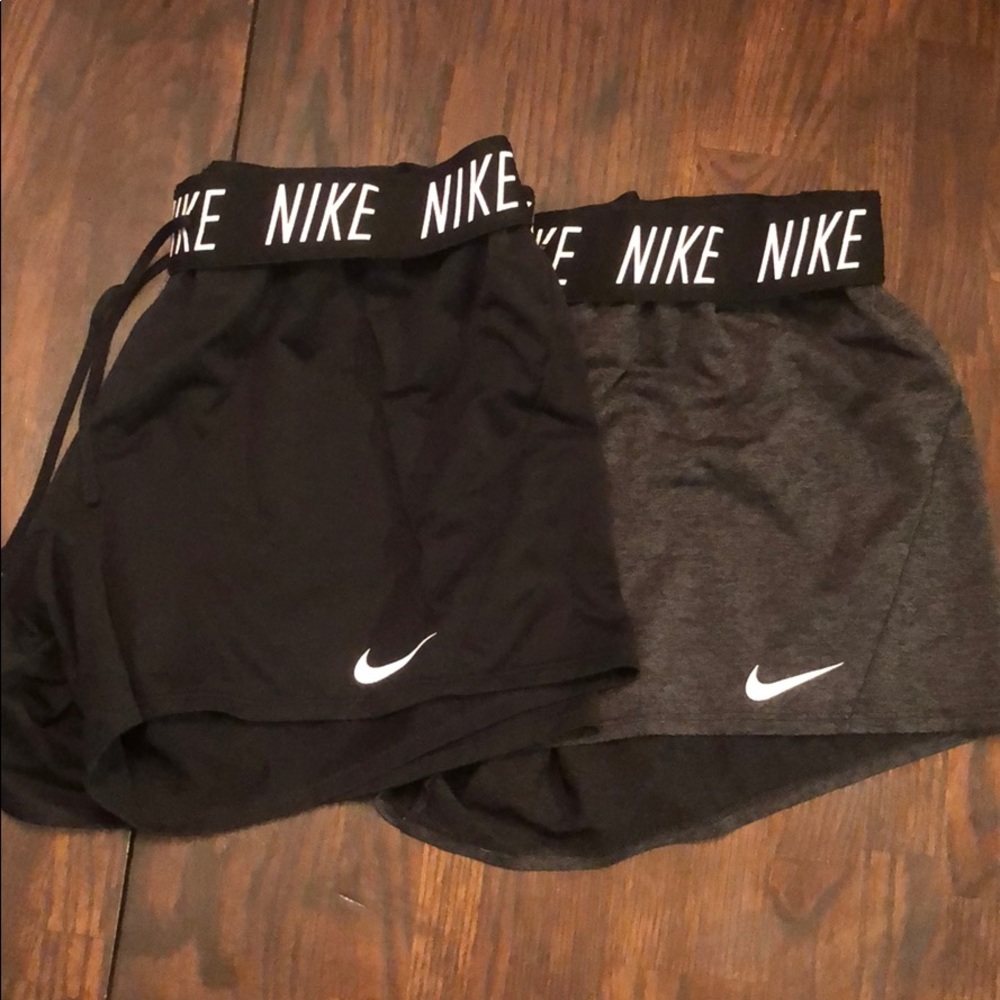 2 pairs of large Nike shorts